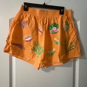 QOS Orange Seashell Print Women's Shorts